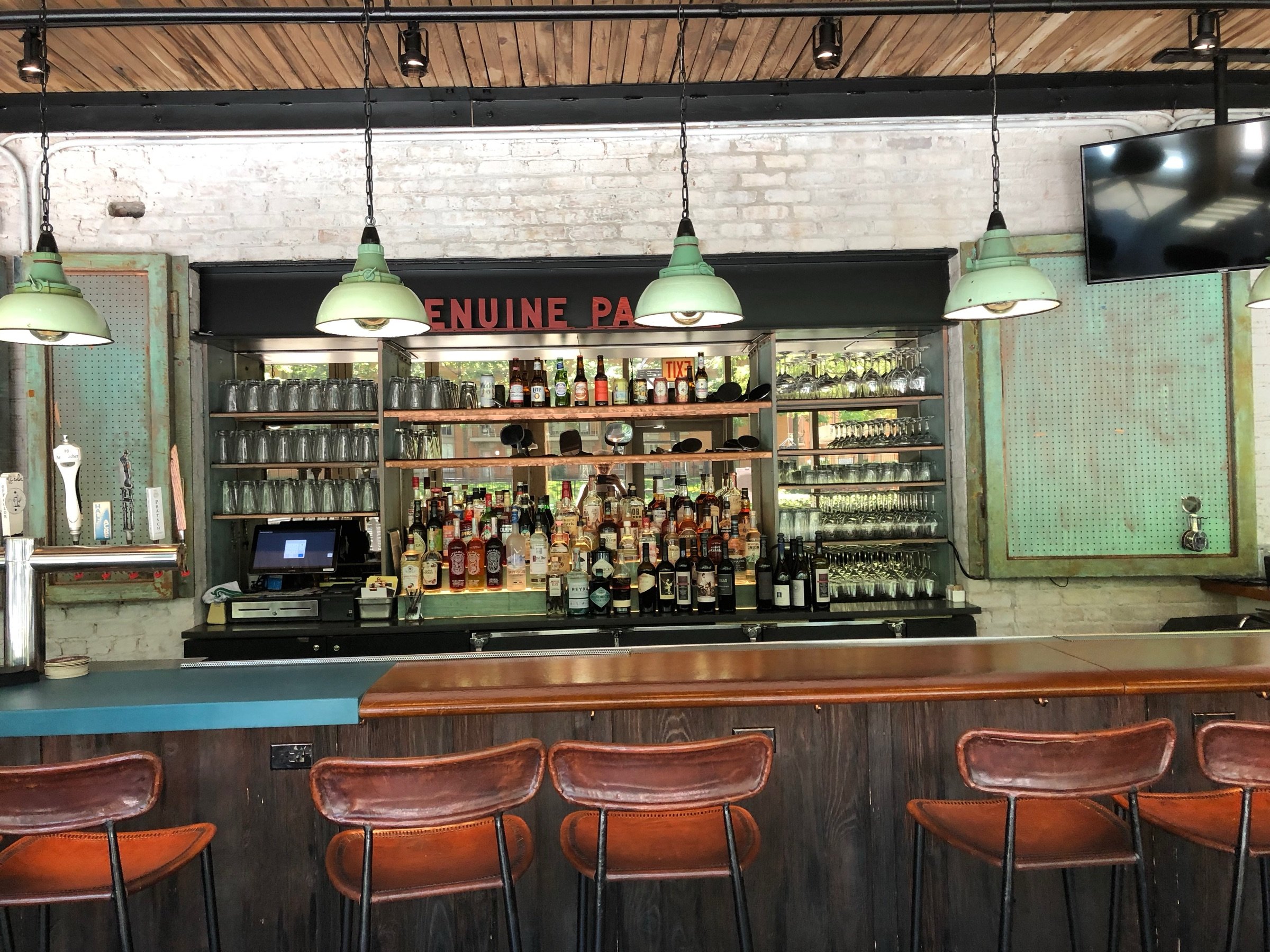 Bar back shelving and accessory display at Roberts Pizza